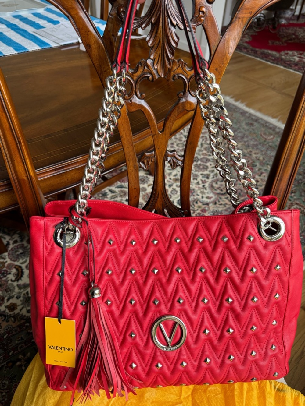 Valentino by Mario “Valentino Bags" Luisa D Studded Quilted Leather Bag in red.